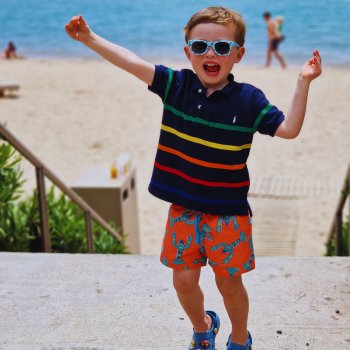 Child on beach jumping