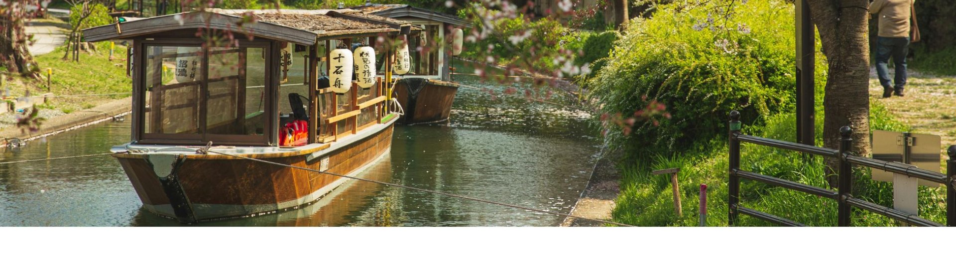 Boat traveling on river in Japan