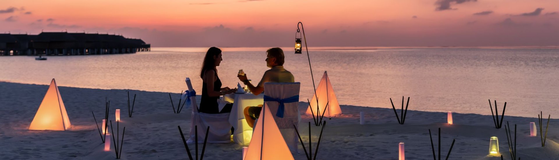 couple having romantic meal on a beach